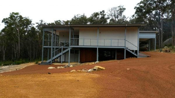 house with red sand